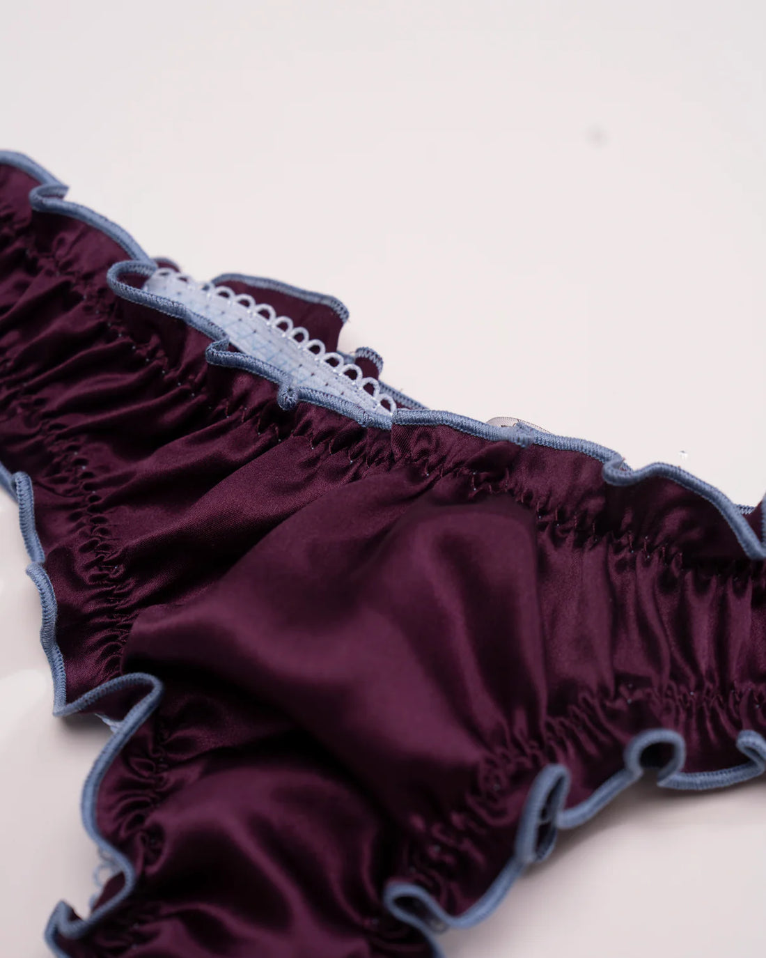 La Isabella: Deep Burgundy Silk Tanga with Baby Blue Trim
